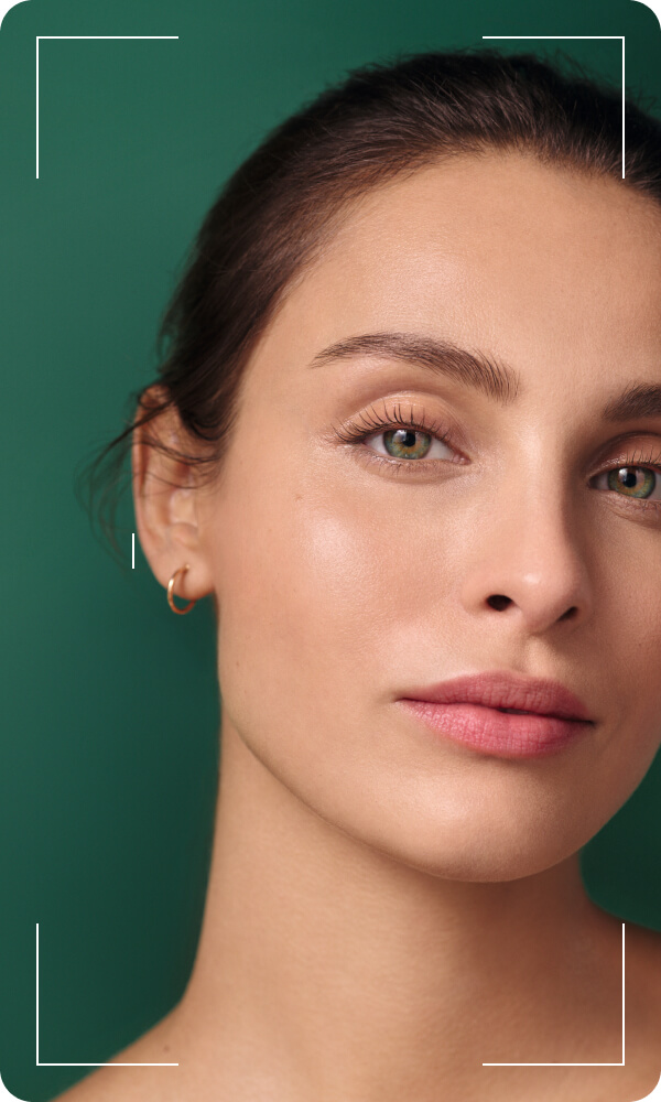 Woman portrait on green background